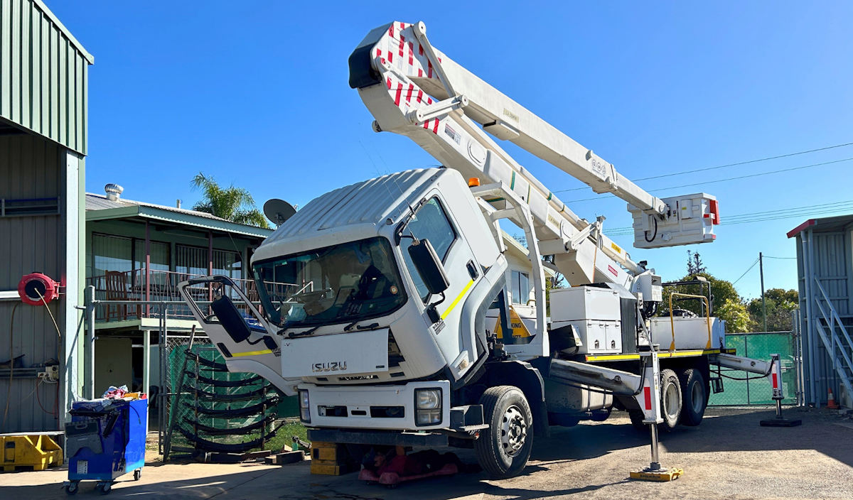 Isuzu crane truck being serviced in Collinsville mechanical workshop